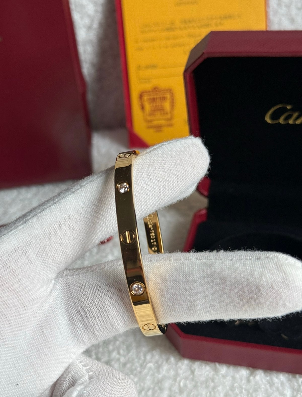 CARTIER LOVE - ARMBAND, MET 4 DIAMANTEN, Ophalen of Verzenden, Zo goed als nieuw, Goud, Zilver
