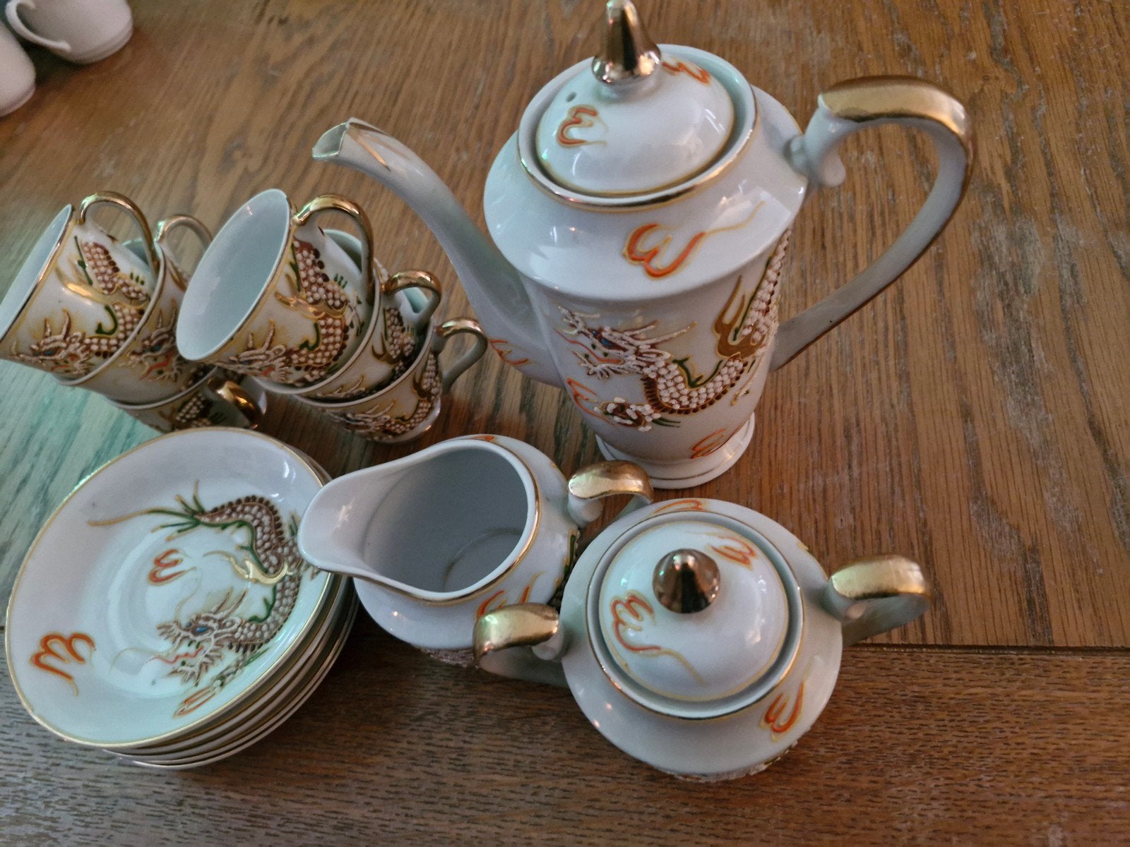Koffie of thee set met afbeelding draak erop, Ophalen