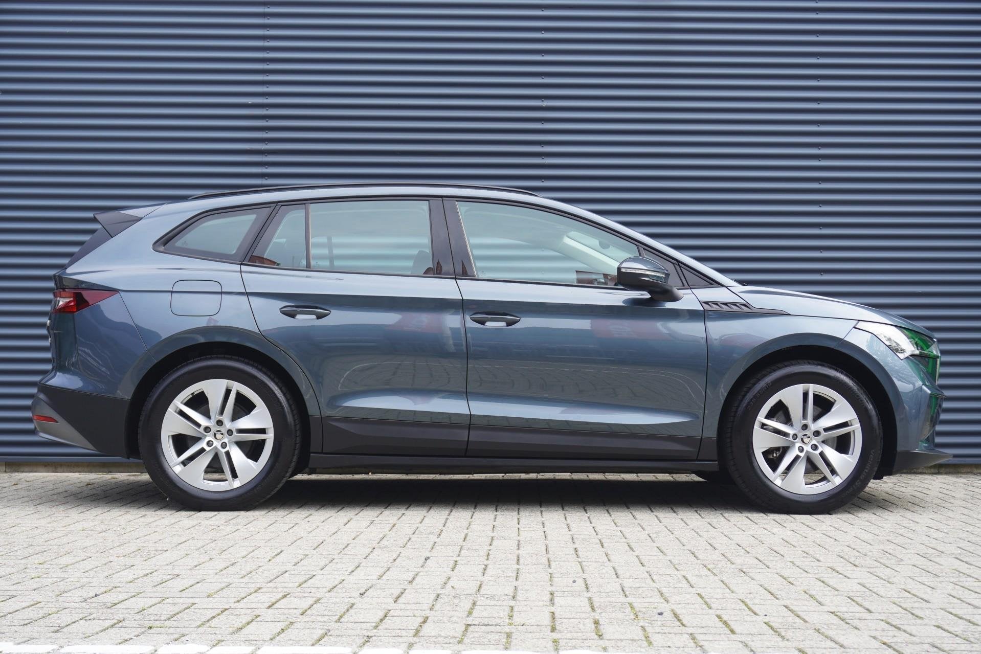 Skoda Enyaq 60 180pk | SoH 94% | Navigatie | Smartlink | Tre, Auto's, Automaat, Gebruikt, Leder en Stof, Origineel Nederlands