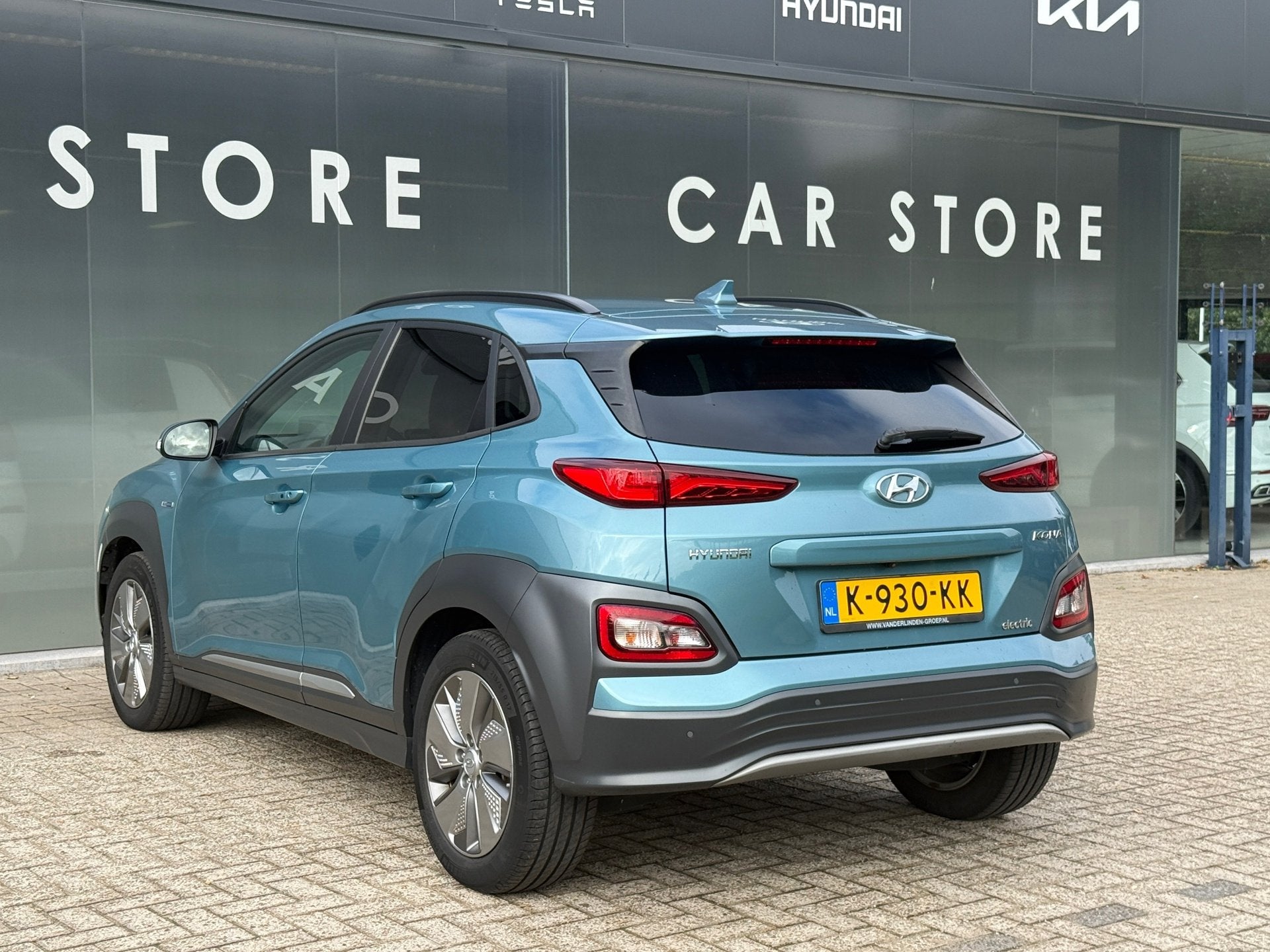 Hyundai Kona EV Limited 64 kWh 100% SOH LEDER MEMORY, Auto's, Dealer onderhouden, Gebruikt, Zwart, Blauw