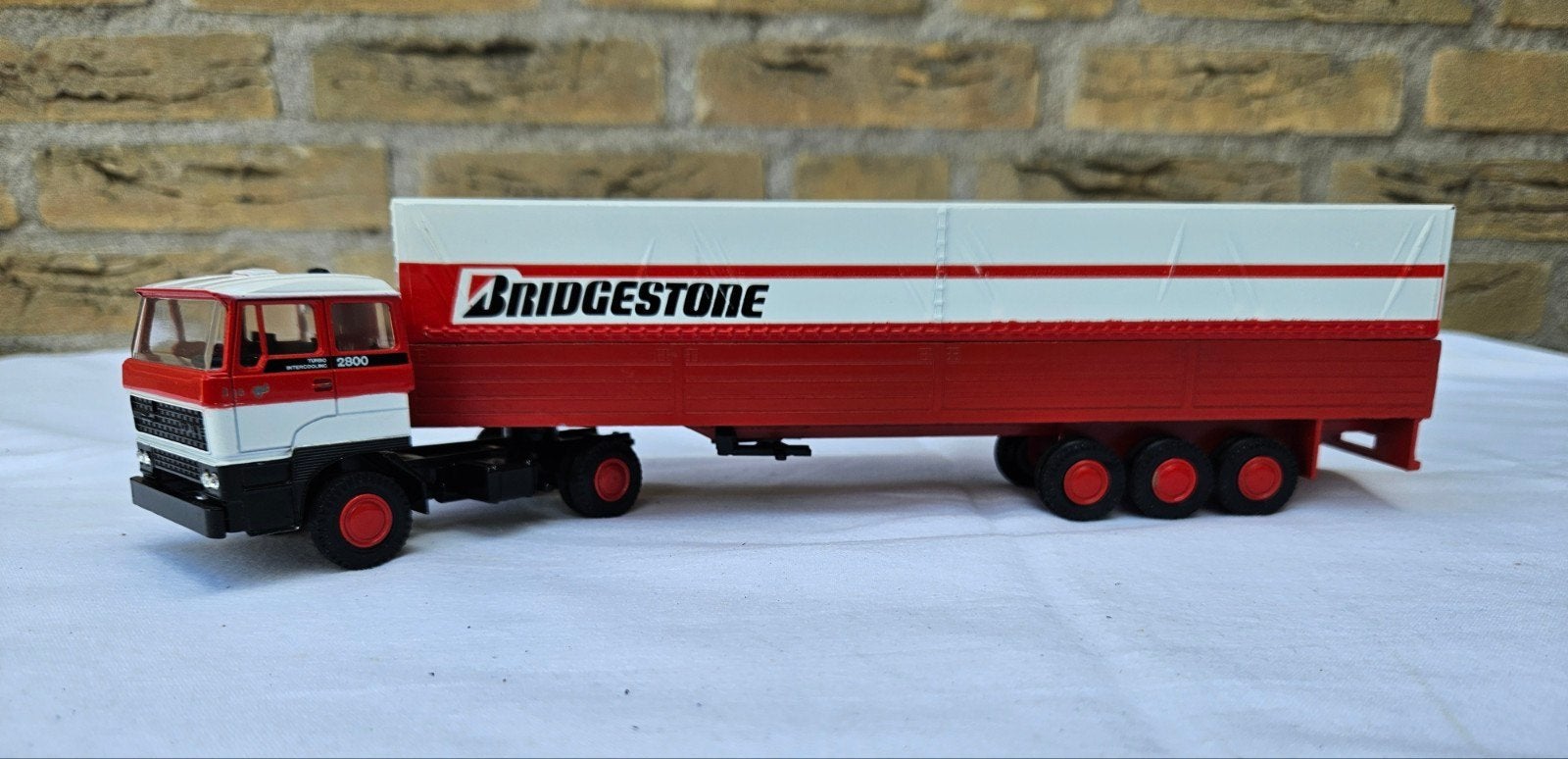 Daf 2800 Lion car,  Bridgestone 3 assige huif trailer., Ophalen of Verzenden, Zo goed als nieuw, Bus of Vrachtwagen, Lion Toys