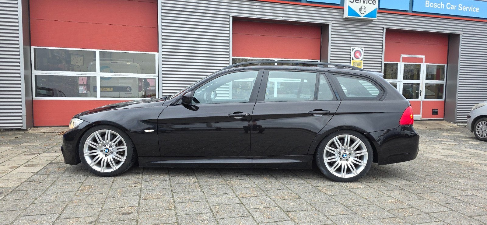 BMW 3-Serie 3.0 I 335 Touring AUT 2010 Zwart, Auto's, BMW, Automaat, Achterwielaandrijving, Zwart, 11 km/l