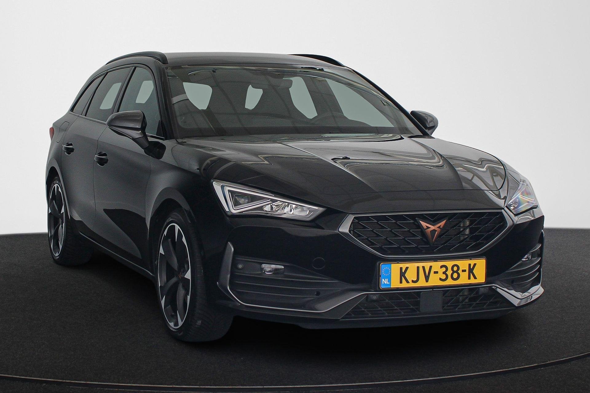 CUPRA Leon Sportstourer 1.4 e-Hybrid Stoelverwarming Apple C, Auto's, Stof, Gebruikt, 4 cilinders, 1589 kg