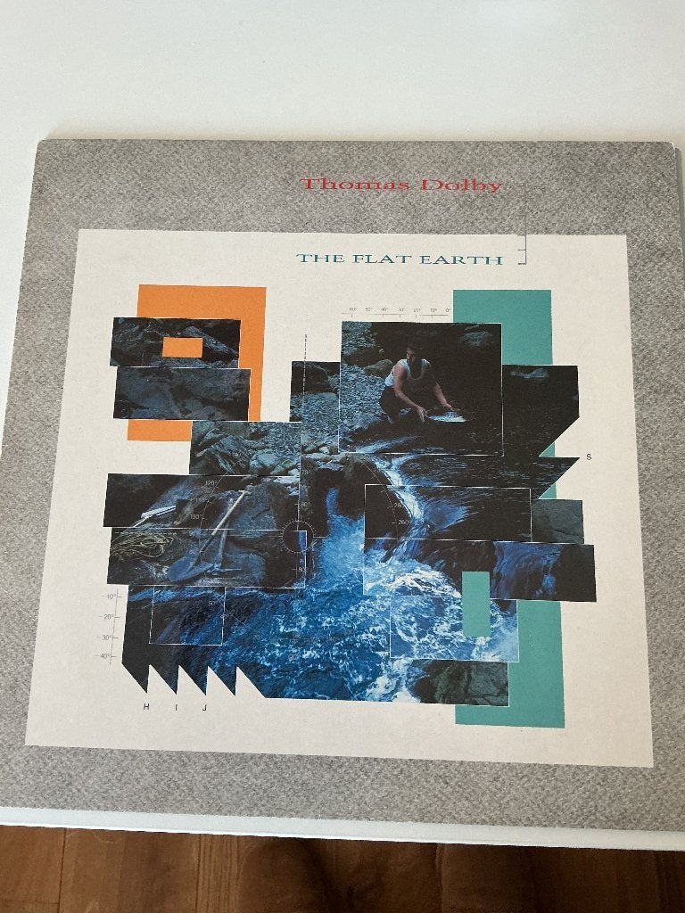 LP Thomas Dolby - The flat earth 1984, Inclusief binnenhoes, Gebruikt, 1980 - 1989, Ophalen of Verzenden