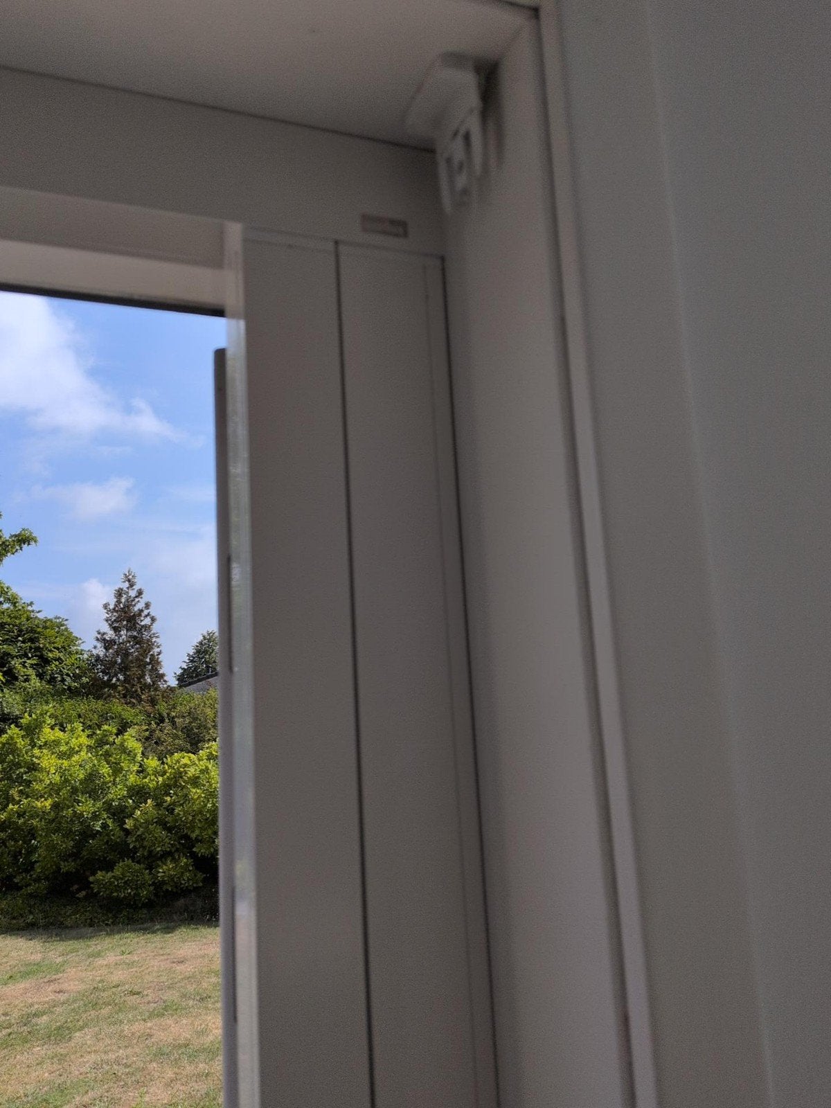Unilux Rolhordeur - Wit frame, Zwart plissé (213x90cm), Ophalen