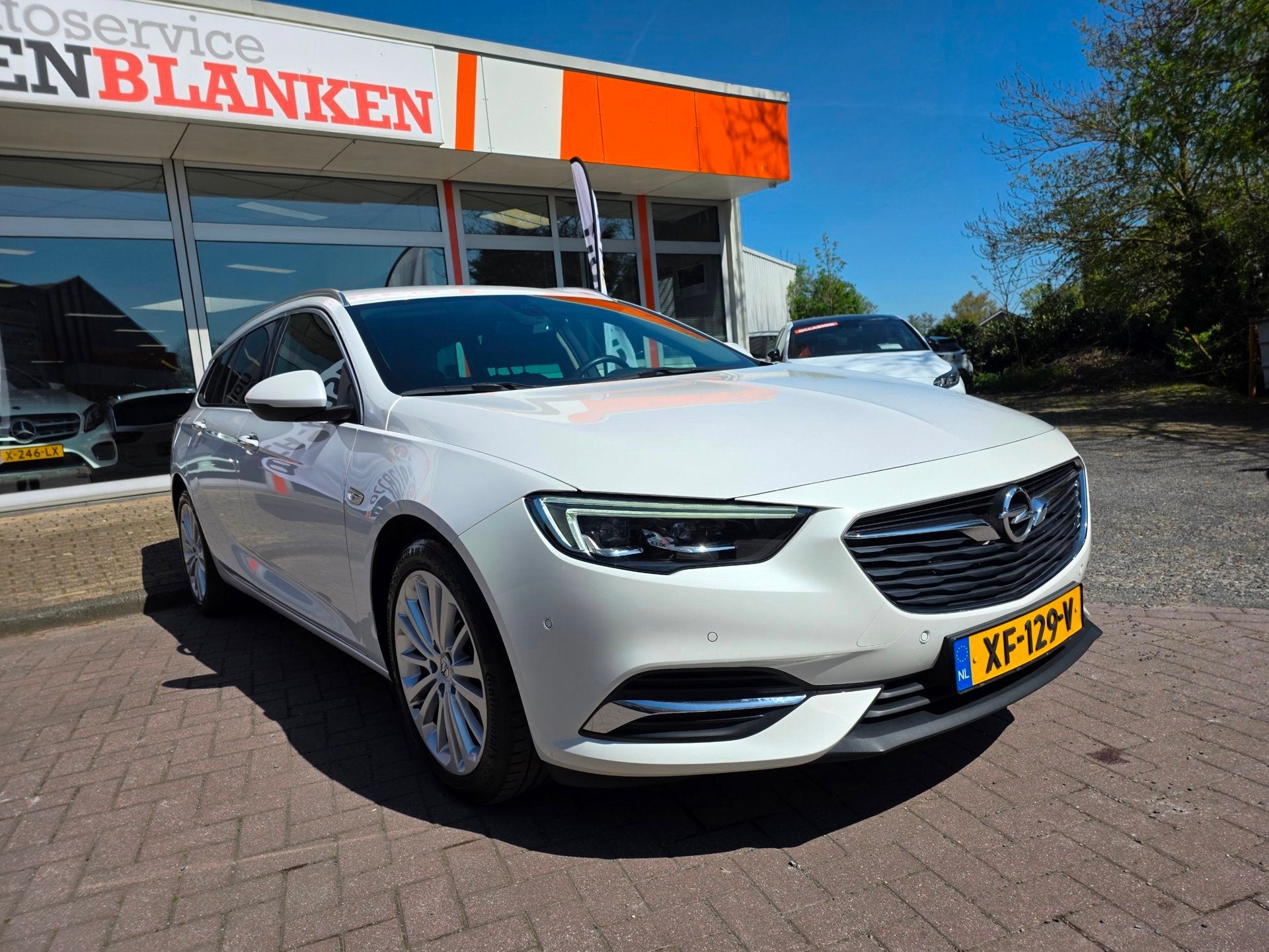 Opel Insignia Sports Tourer 1.6 Turbo Bns Executive 200pk BJ, Auto's, Gebruikt, 4 cilinders, Leder en Stof, Wit