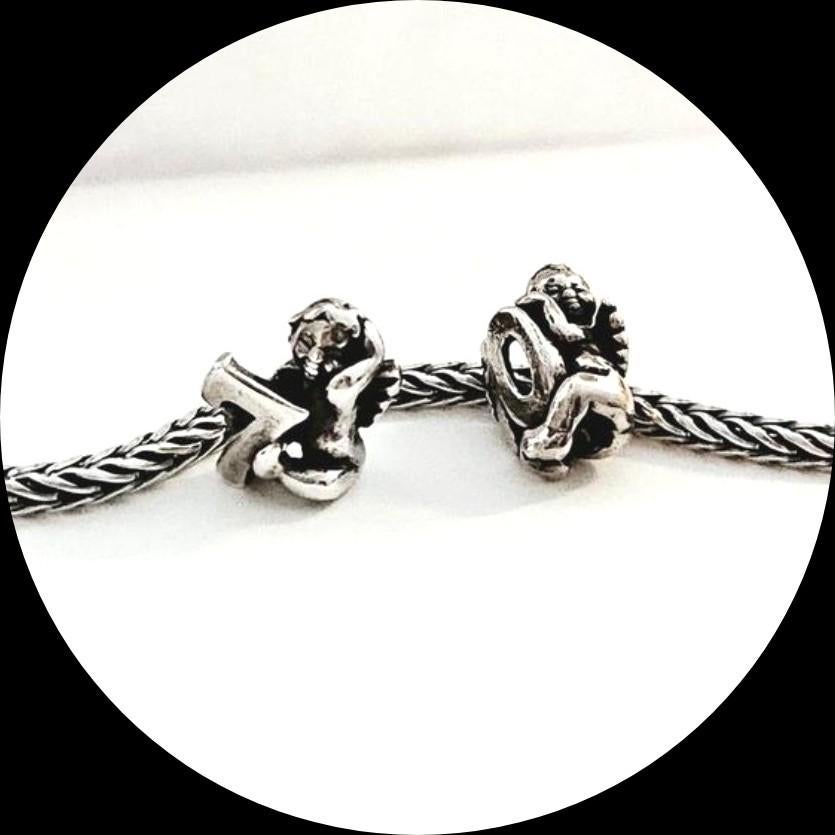 Trollbeads Engel cijfer 7 en 10 / retired, Ophalen of Verzenden, Zo goed als nieuw, Trollbeads, 2 of 3 bedels