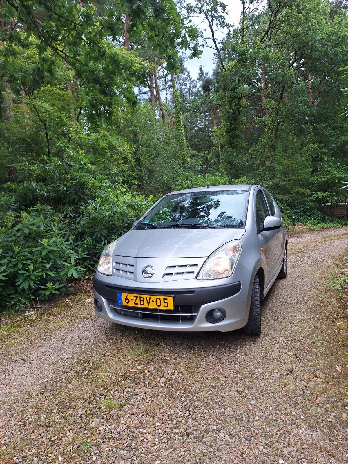 Nissan Pixo 1.0 50KW 5D 2010 Grijs, Voorwielaandrijving, Stof, 200 kg, 4 stoelen