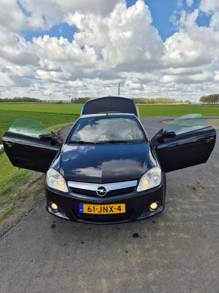 Opel Tigra 1.4 16V Twintop 2009 Zwart, Auto's, Voorwielaandrijving, 4 cilinders, Cabriolet, Origineel Nederlands