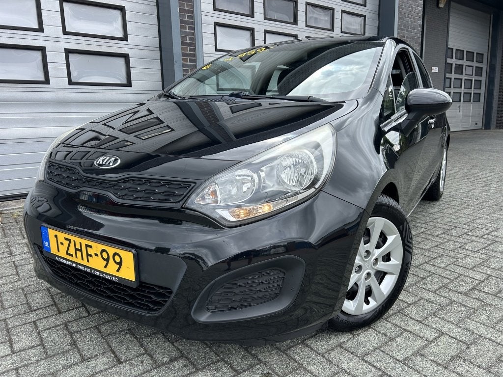 Kia Rio 1.2 CVVT Comfort 5DRS Airco Rijdt TOP! NAP, 21 km/l, Zwart, 4 cilinders, Zwart