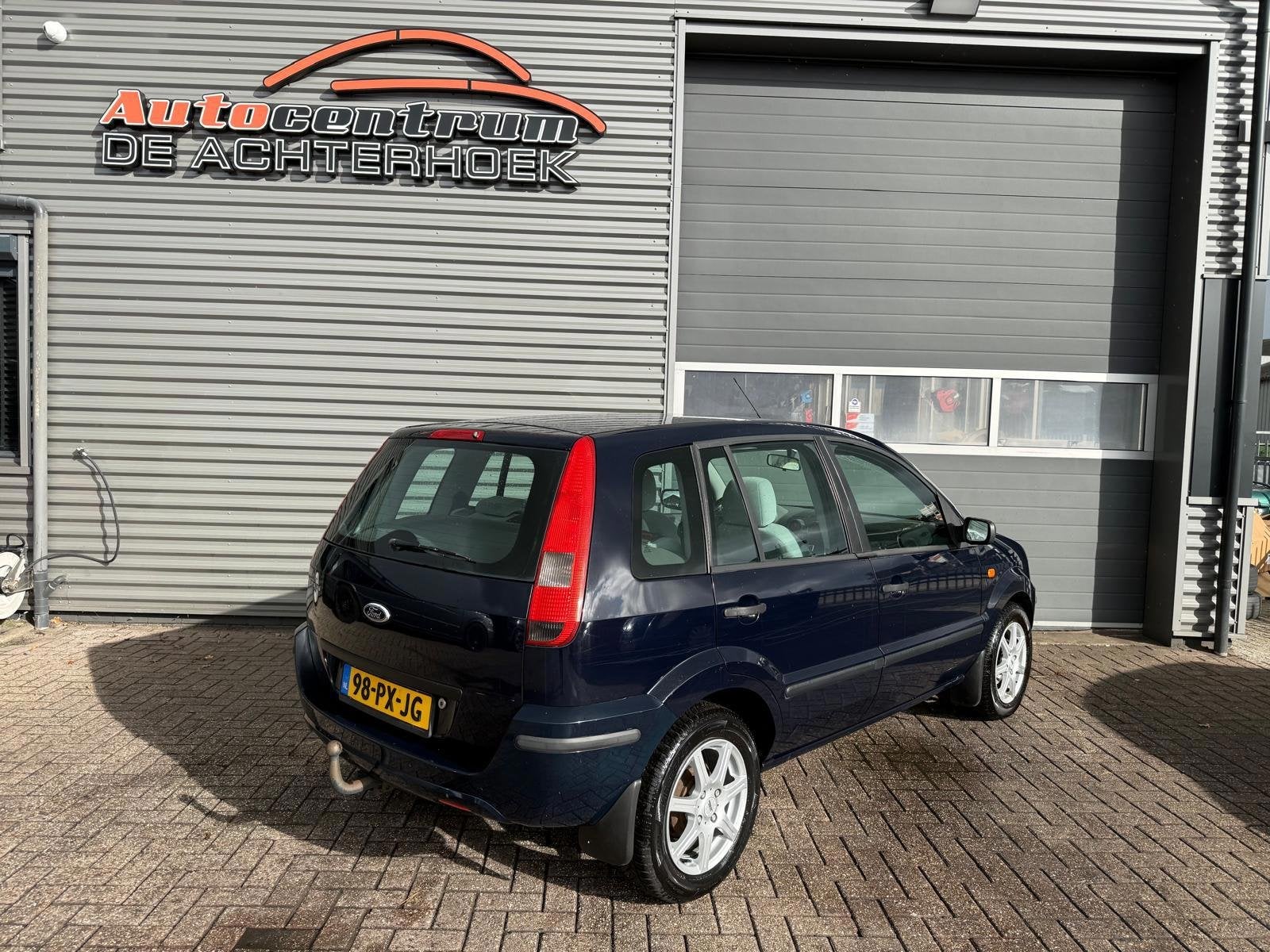 Ford Fusion 1.4-16V Ghia, Auto's, Voorwielaandrijving, Blauw, Origineel Nederlands, Bedrijf