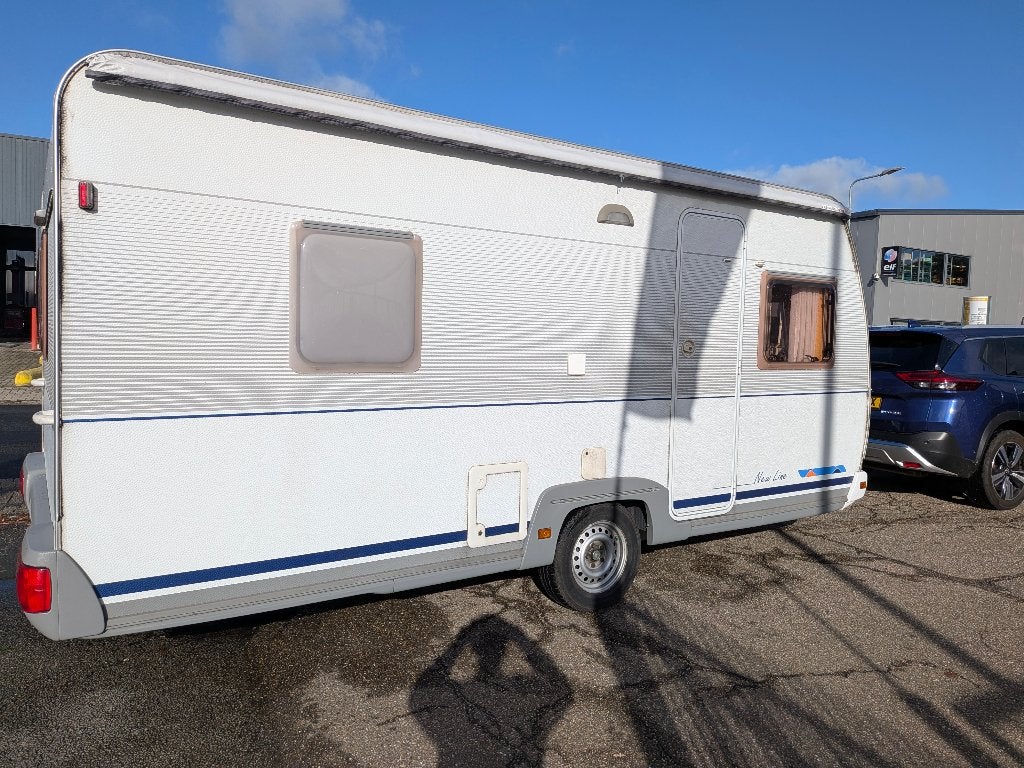 Dethleffs New Line 450 DB, Caravans en Kamperen, Vast bed, Rondzit, Fietsenrek, 750 - 1000 kg