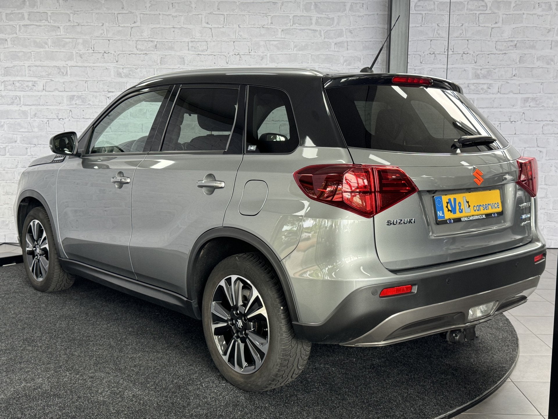 Suzuki Vitara 1.4 Boosterjet Style Smart Hybrid AllGrip 4x4, Auto's, Gebruikt, 4 cilinders, 129 pk, 400 kg