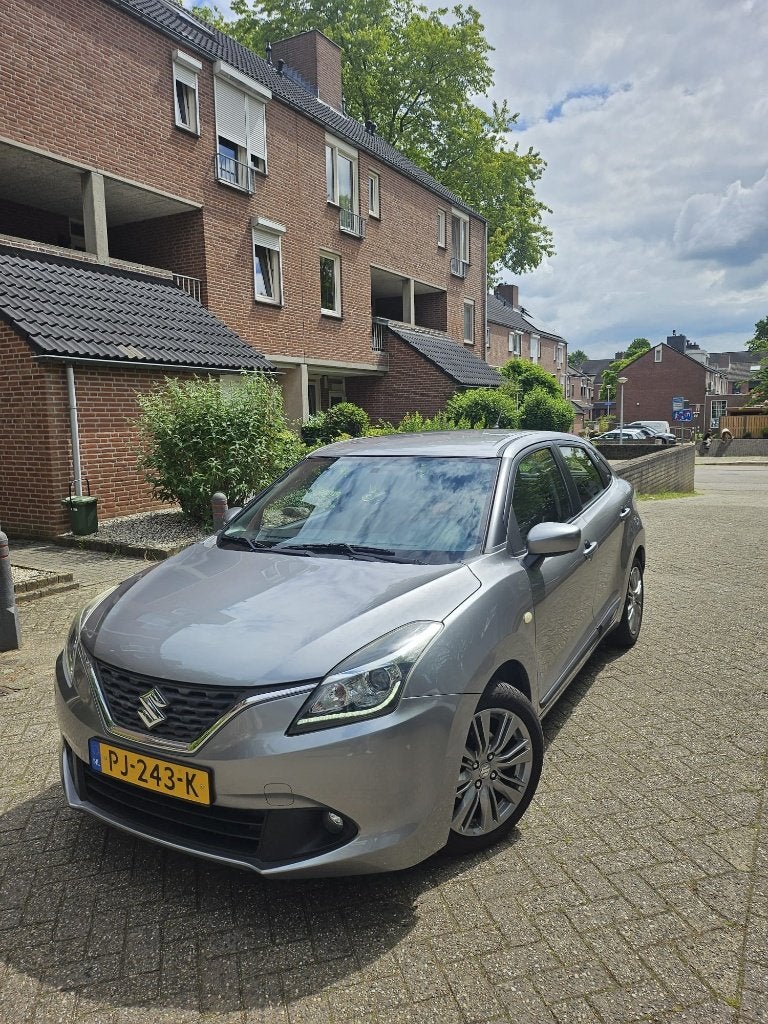Suzuki Baleno 1.2 Dualjet 90pk 2017 Grijs, Auto's, Achterwielaandrijving, 4 cilinders, 840 kg, Origineel Nederlands