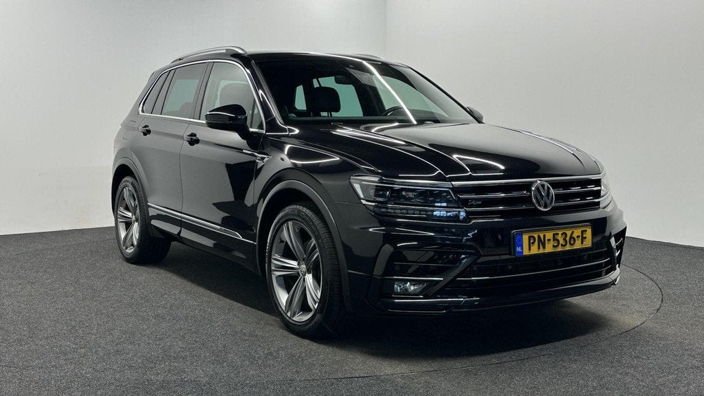 Volkswagen Tiguan 1.4 TSI ACT Comfortline Business R LEER CA, Voorwielaandrijving, 4 cilinders, Zwart, Handgeschakeld