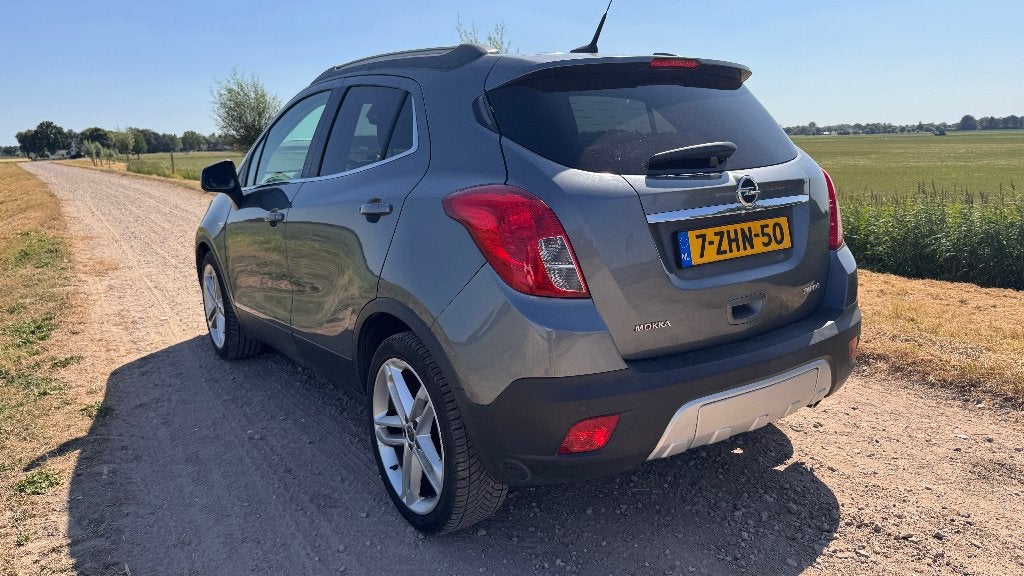 Opel Mokka 1.4 Turbo 16V 103KW Aut6 2014 Grijs, Auto's, 15 km/l, 4 cilinders, Particulier, SUV of Terreinwagen