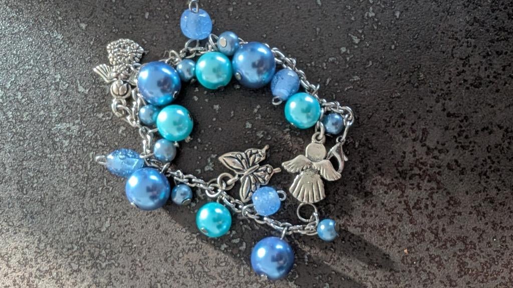 Bedelermband, Ophalen of Verzenden, Zo goed als nieuw, Blauw, Met bedels of kralen