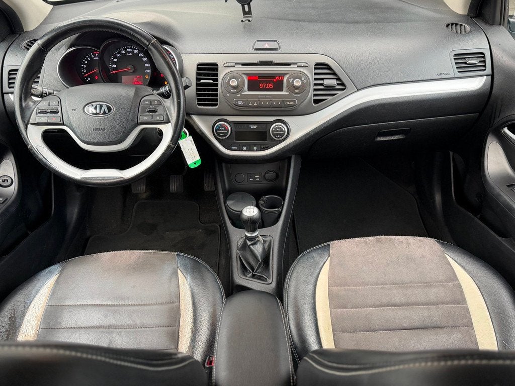 Kia Picanto 1.0|NAP|AIRCO|CRUISE|LEER|LM|5D|GARANTIEMOGELIJK, Auto's, Kia, Voorwielaandrijving, Euro 5, Gebruikt, Wit