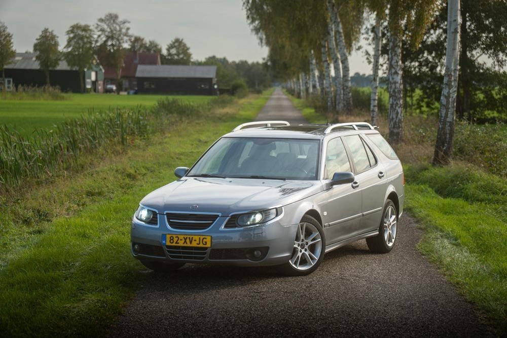 Saab 9-5 2.3 T Biopower Sport Estate AUT 2007 Grijs, Auto's, Dealer onderhouden, 1800 kg, 4 cilinders, 2290 cc