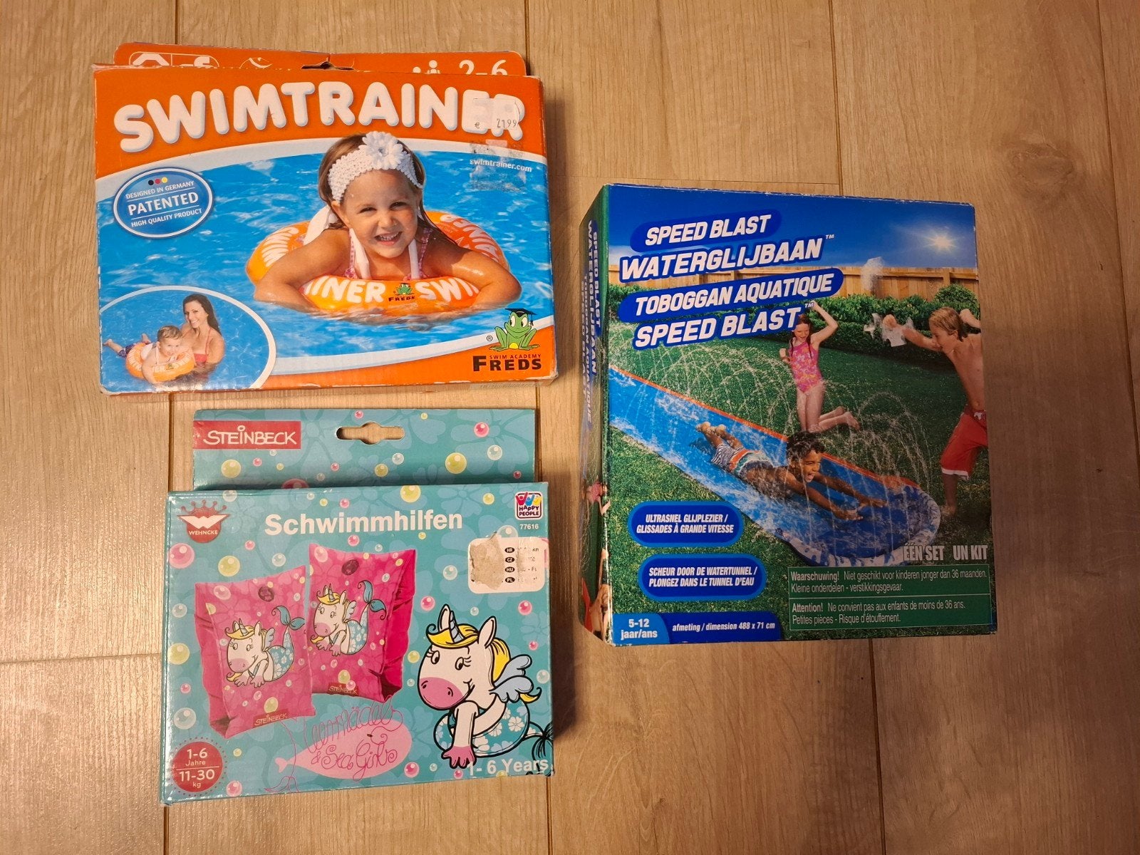 3x nieuwe waterpret: glijbaan, swimtrainer, zwemvleugels, Ophalen, Nieuw