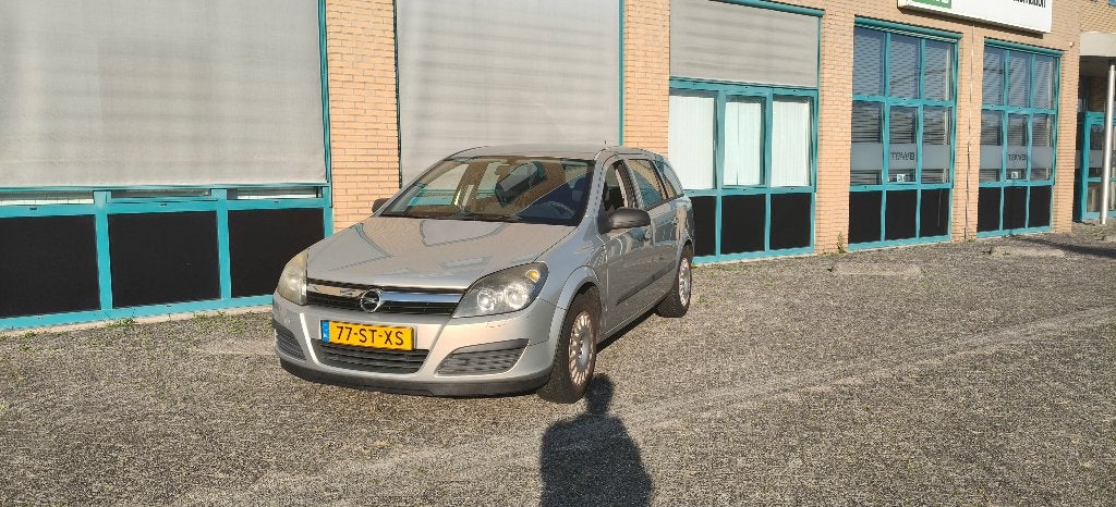 Opel Astra 1.6 Station 2006 - APK 01-03-2027, Auto's, Voorwielaandrijving, Zwart, 4 cilinders, Origineel Nederlands