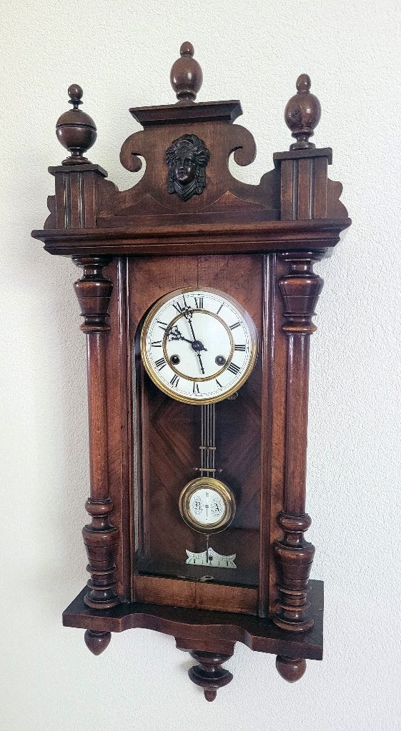 Antieke regulateur wandklok, Ophalen