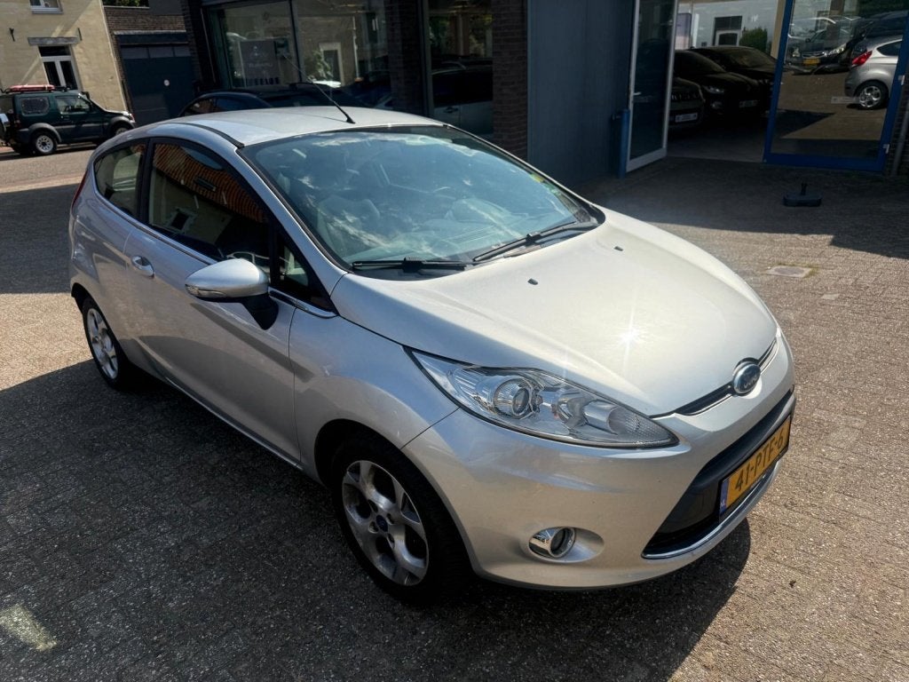 Ford Fiesta 1.4 Titanium (bj 2011), Auto's, Ford, Euro 5, Gebruikt, 31 €/maand, 4 cilinders
