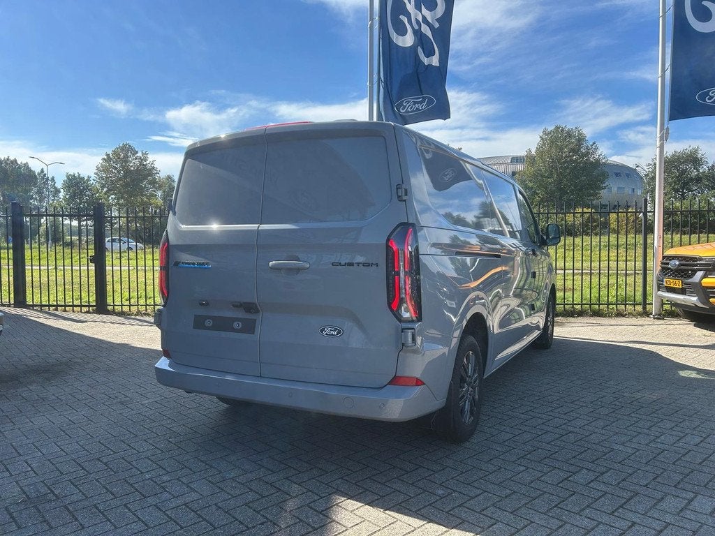 Ford E-Transit Cust. 320 L2H1 Limited 65 kWh | Driver Assist, Auto's, Bestelauto's, Automaat, 470 min, 218 pk, Nieuw