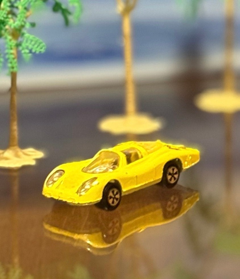 Gele PORSCHE Le Mans No. 232 MAJORETTE 7cm, Hobby en Vrije tijd, Modelauto's | Overige schalen, Ophalen of Verzenden, Gebruikt
