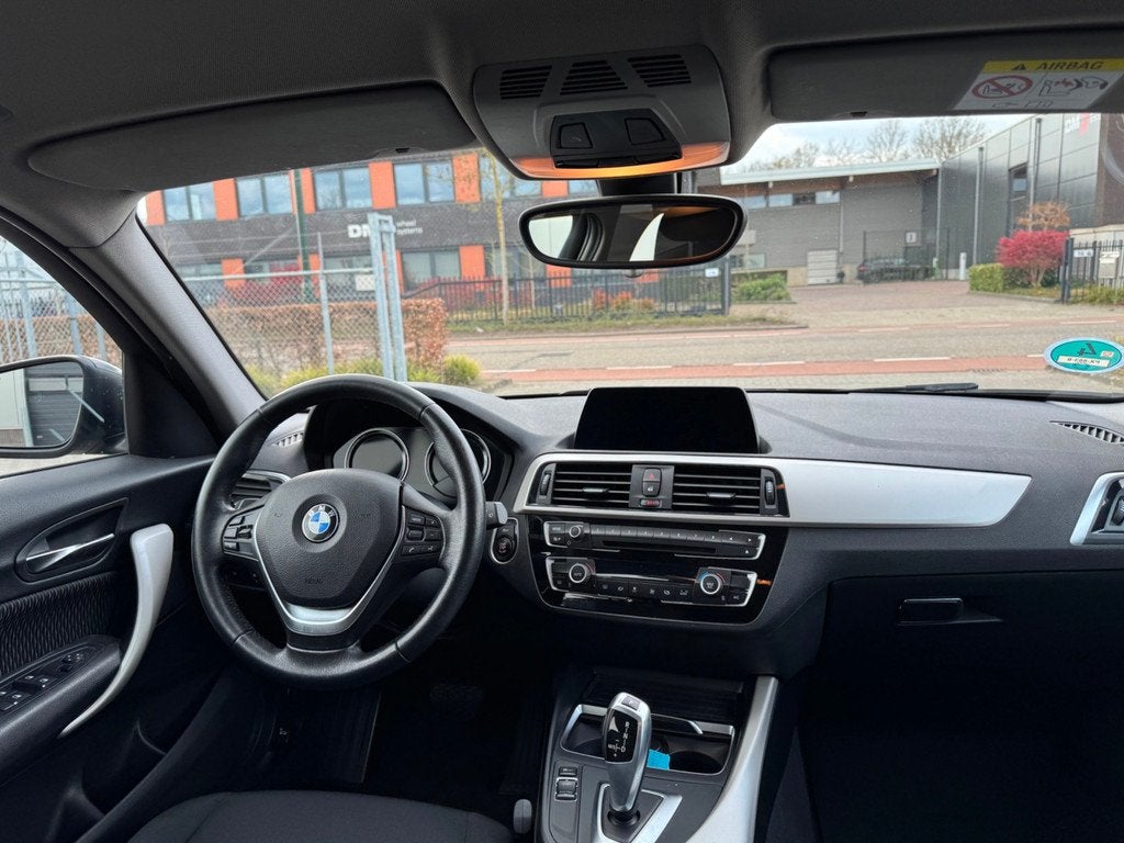 BMW 1-serie 118i Corporate Lease Executive, Auto's, BMW, 12 maanden, Gebruikt, Zwart, Origineel Nederlands