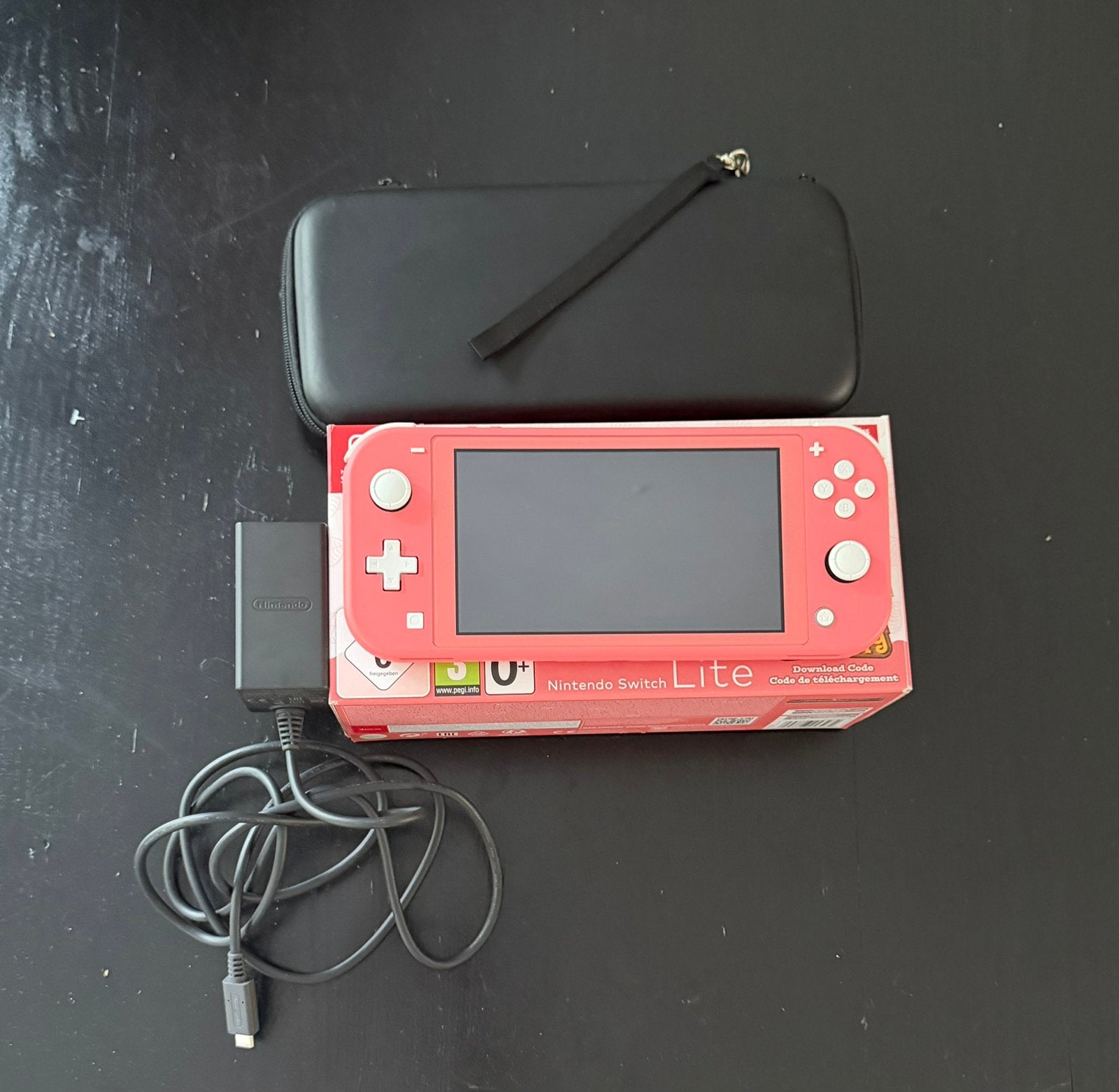 Nintendo Switch Lite Coral, Spelcomputers en Games, Spelcomputers | Nintendo Switch Lite, Ophalen of Verzenden, Zo goed als nieuw