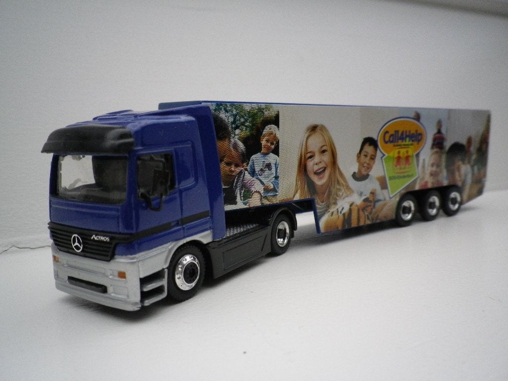 Schuco Mercedes Actros Cal4help .1/87 Schaalmodel., Ophalen of Verzenden, Gebruikt, Bus of Vrachtwagen, Schuco