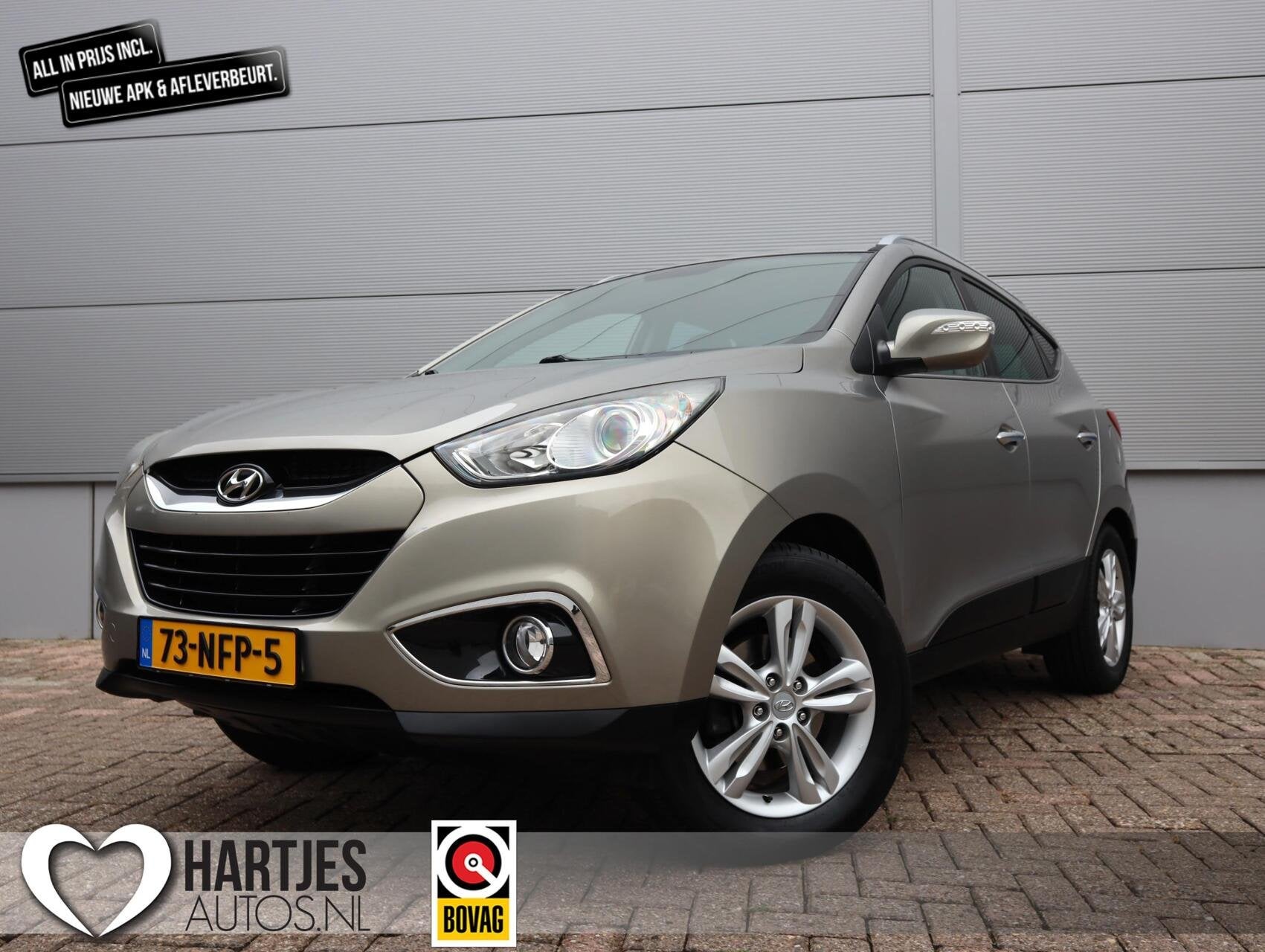Hyundai ix35 2.0i Style (Vol-Opties!) Parelmoer NL-auto, Gebruikt, 4 cilinders, Met garantie (alle), Leder en Stof