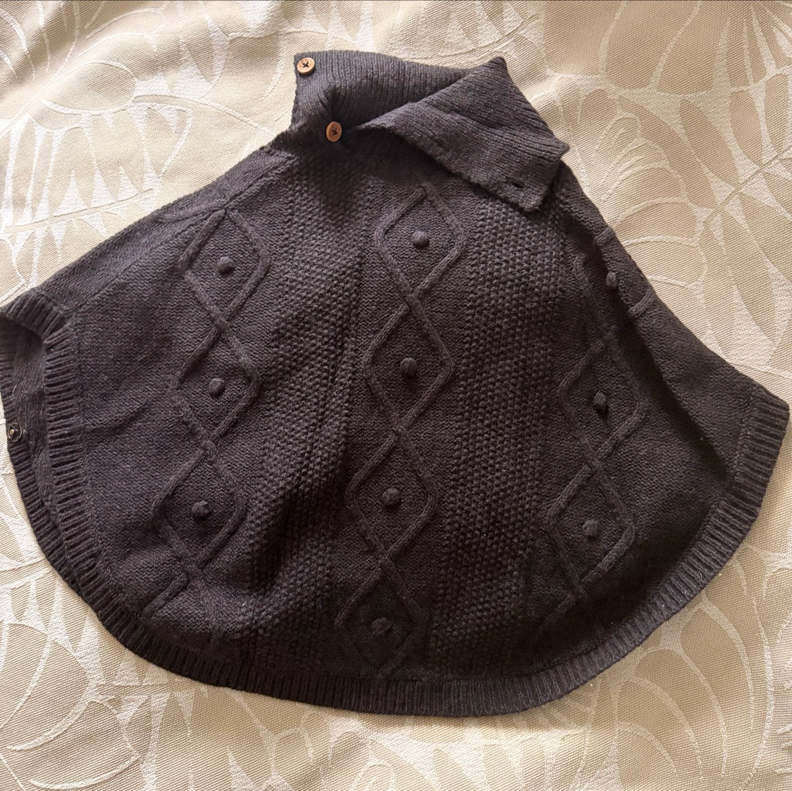 Jirouette gebreide poncho/cape in donkergrijs, Ophalen, Zo goed als nieuw, Maat 34 (XS) of kleiner, Grijs