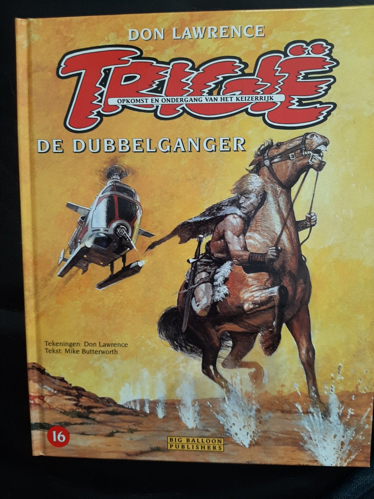 Trigië: De Dubbelganger - Boek 16 (Don Lawrence), Eén stripboek, Ophalen of Verzenden, Gelezen, Don Lawrence