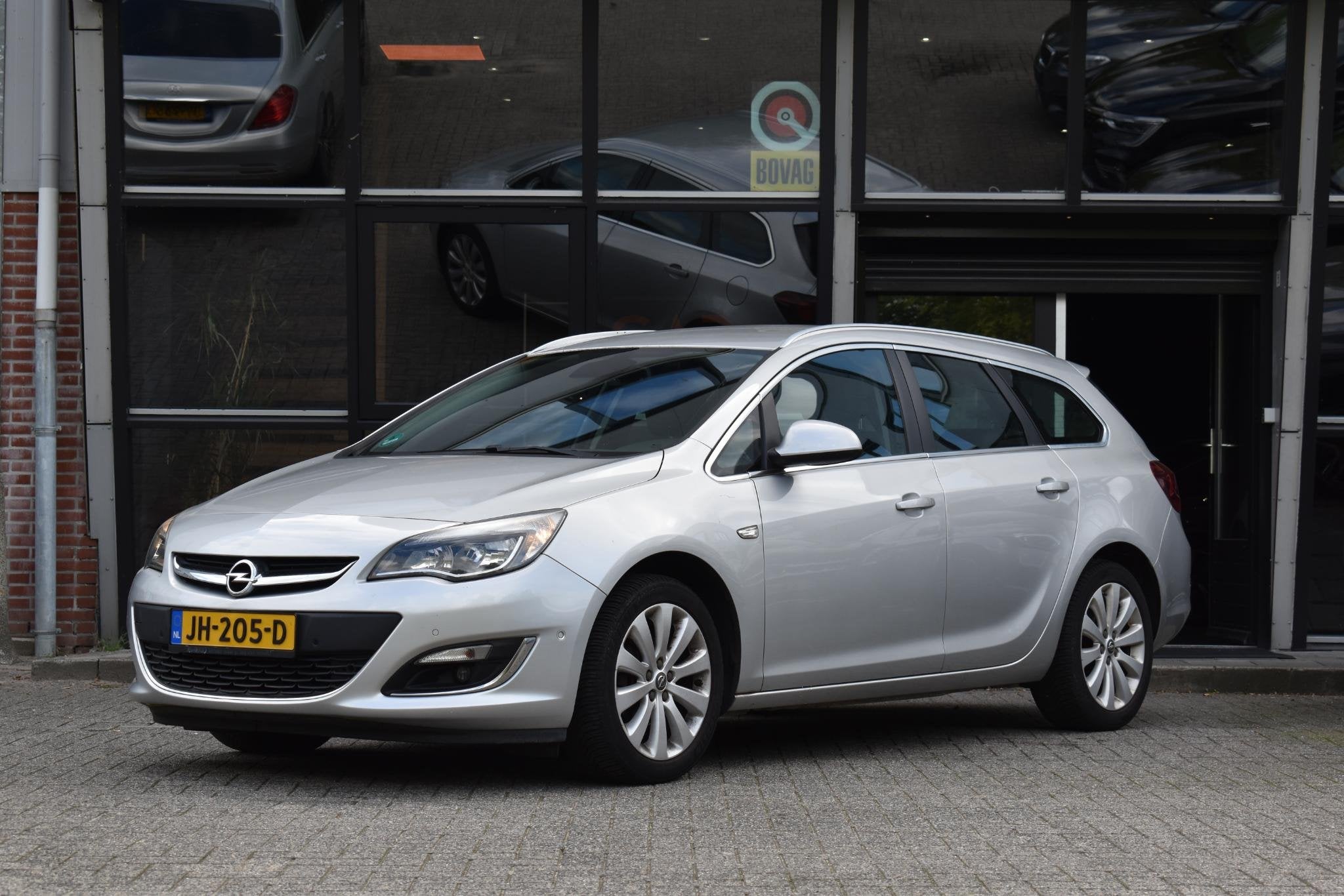 Opel Astra Sports Tourer 1.4 Turbo Sport Camera Cruise Trekh, Auto's, Voorwielaandrijving, Stof, Gebruikt, Huisgarantie