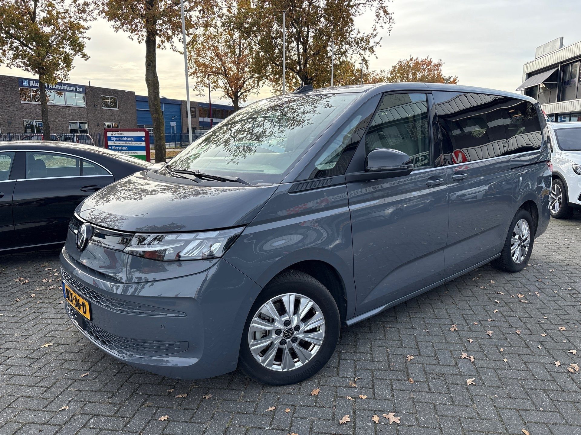 Volkswagen MULTIVAN 1.4 eHybrid L2H1 Life Business 6 persoon, Auto's, Stof, Gebruikt, Plug-in hybride, Hybride Elektrisch/Benzine