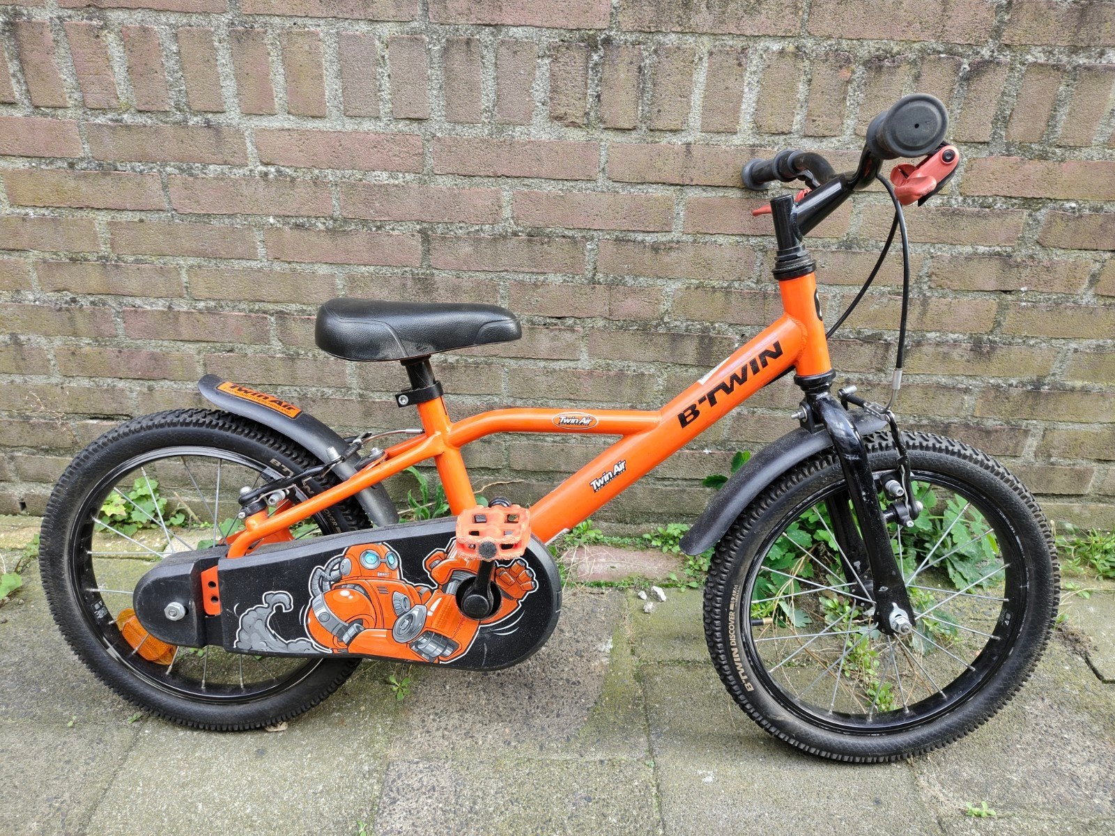 B'Twin Kinderfiets Oranje 16 inch - Gebruikt, Fietsen en Brommers, Ophalen, Velgrem, B'Twin, 16 tot 20 inch