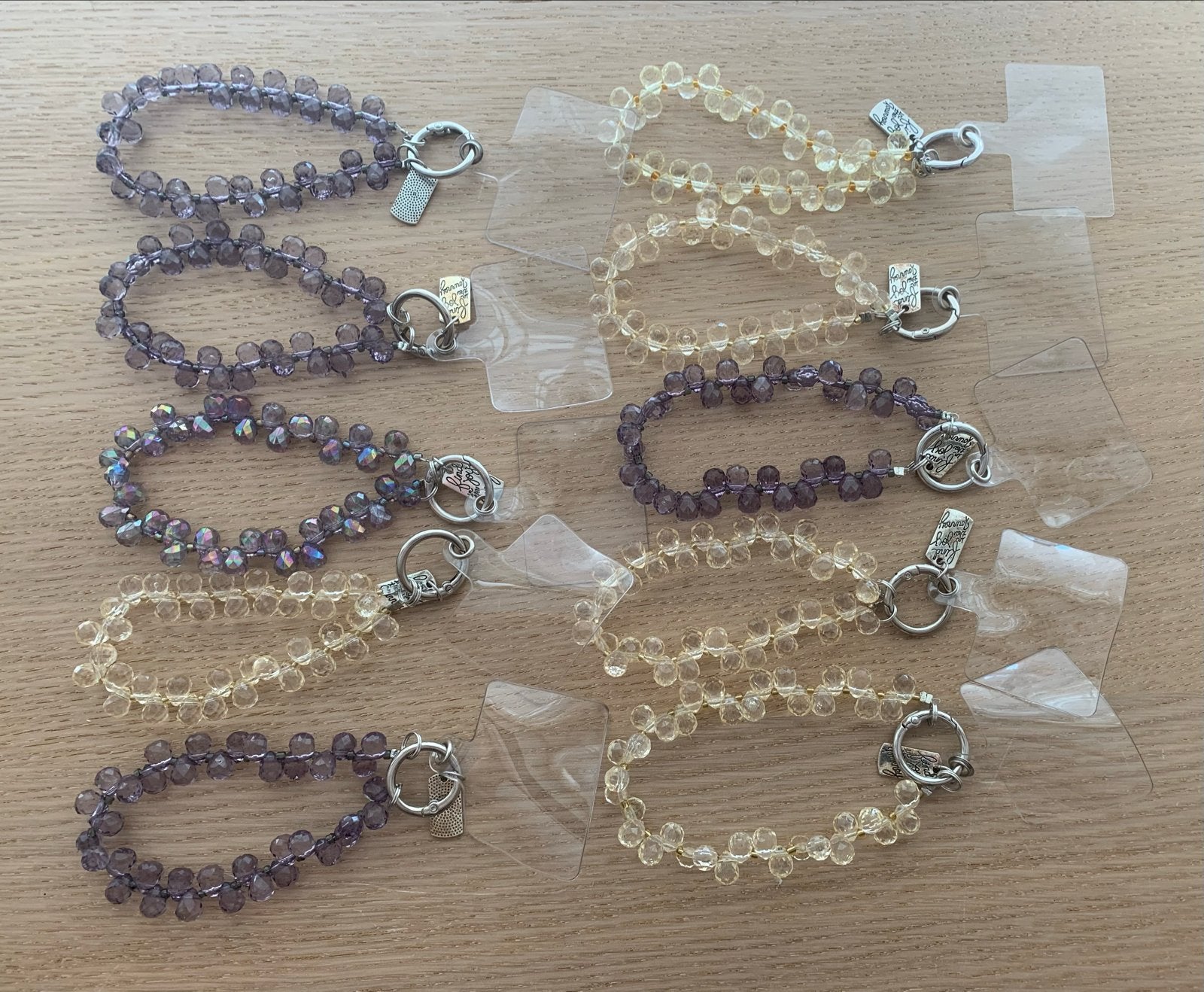 10 stuks Telefoon hangers in geel en paars, Ophalen of Verzenden, Nieuw, Overige merken