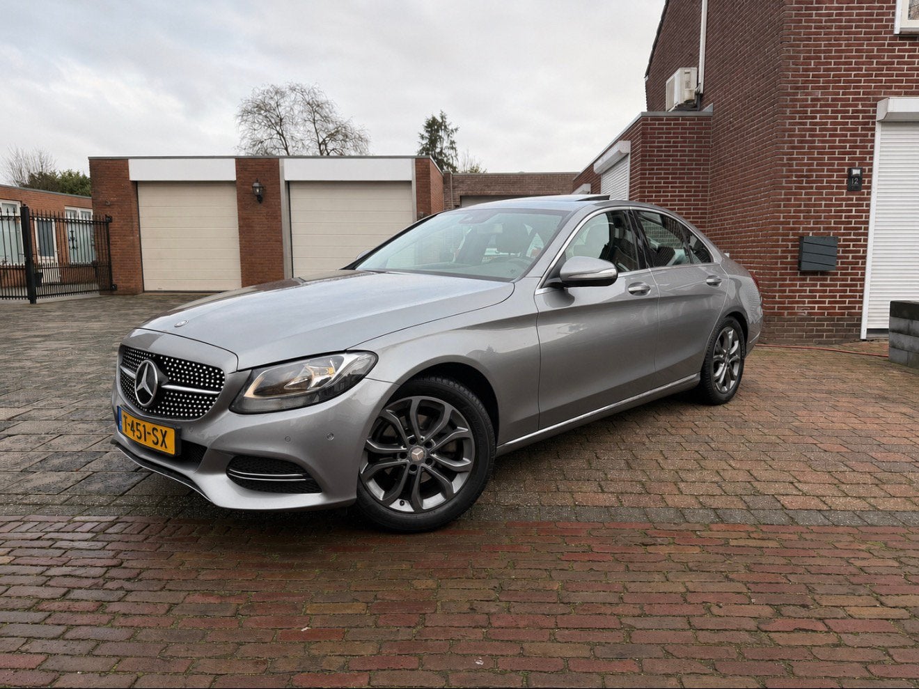 Mercedes-Benz C-Klasse C180 1.6 115KW Aut7 2014 Grijs, Automaat, 1800 kg, Leder en Stof, 1595 cc