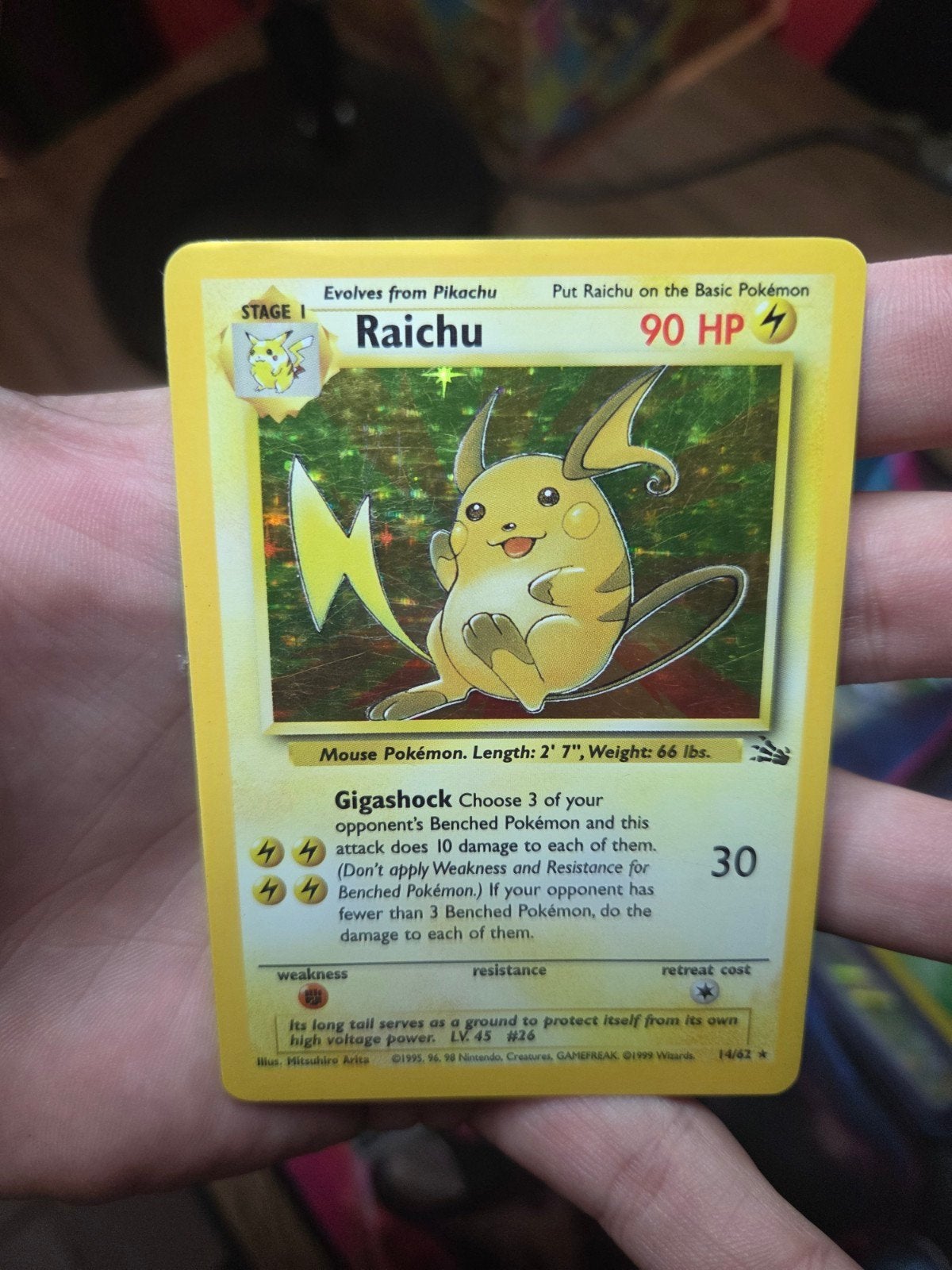 Raichu 14/62 Holo Fossil 1999 Wotc era Vintage nr1, Ophalen of Verzenden, Zo goed als nieuw, Losse kaart, Foil