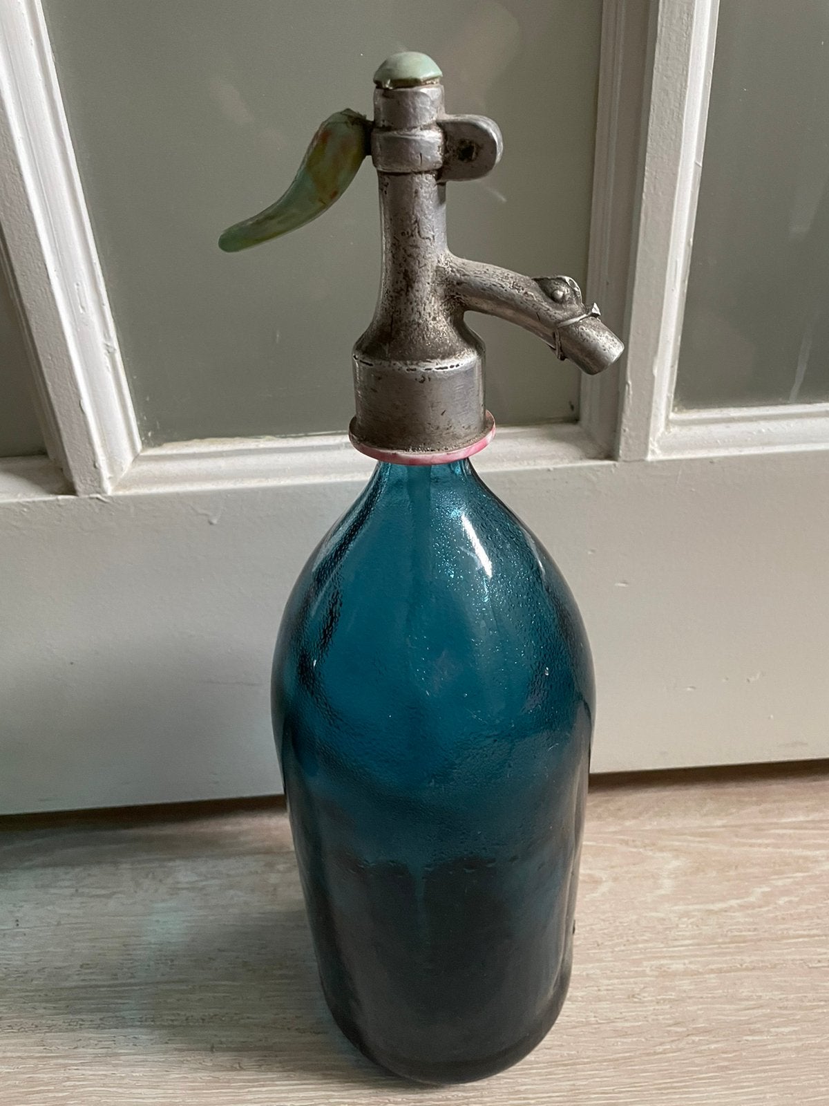 Spuitflessen blauw of groen, Ophalen