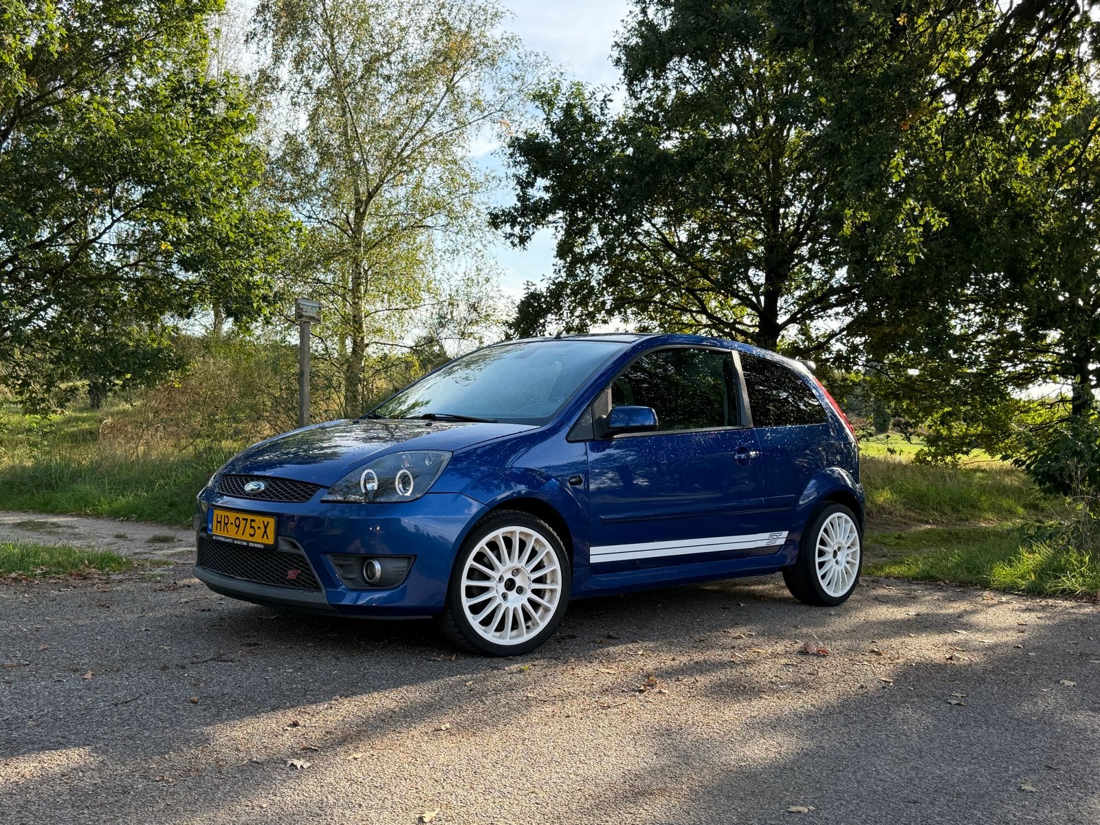 Ford Fiësta 2.0 16V ST 3DR 2006 Blauw, Auto's, Voorwielaandrijving, Bluetooth, Zwart, 4 cilinders