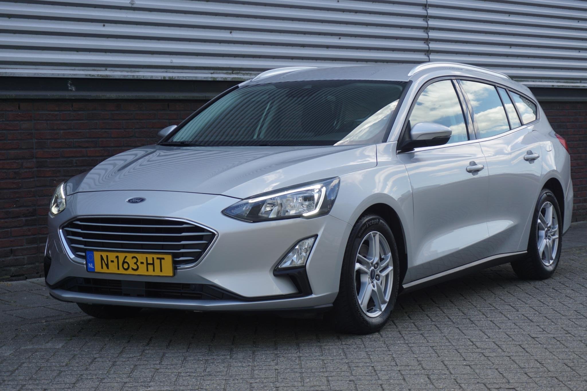 Ford Focus Wagon 1.0 EcoB.125PK Hybrid Business/AGR-Comforts, Gebruikt, Origineel Nederlands, Zilver of Grijs, 999 cc