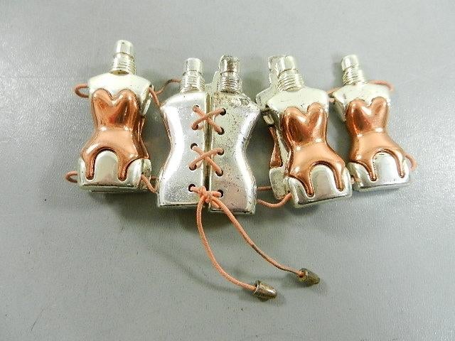 Vintage armband Jean Paul Gaultier parfum, Ophalen of Verzenden, Gebruikt, Zilver, Overige materialen