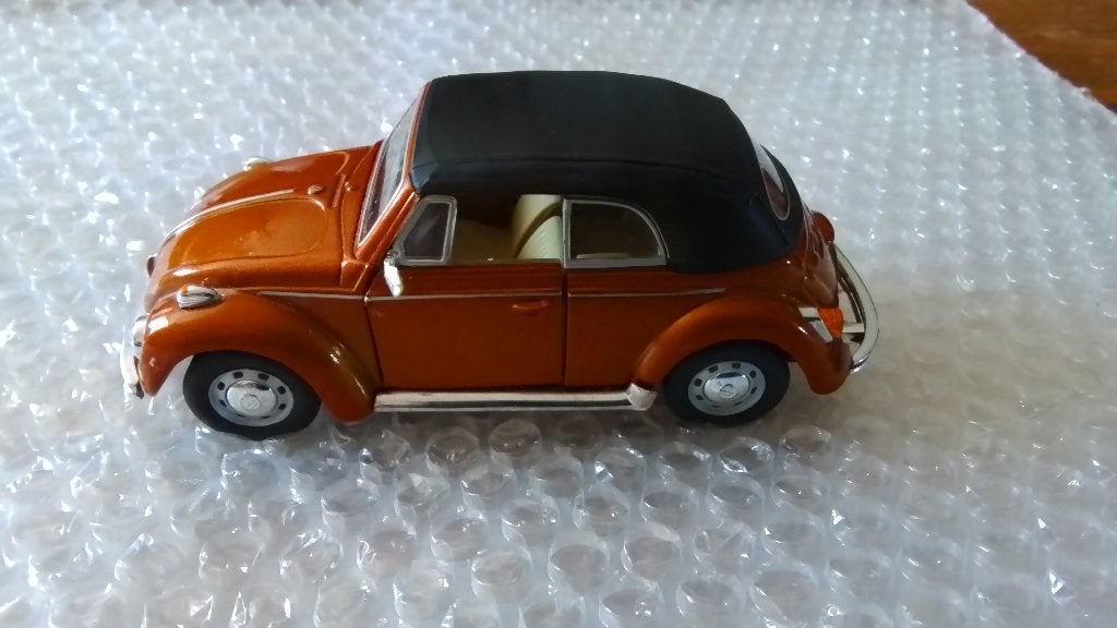 In mooie en goede staat vw kever cabrio 1/43, Ophalen of Verzenden, Zo goed als nieuw, Auto, Overige merken
