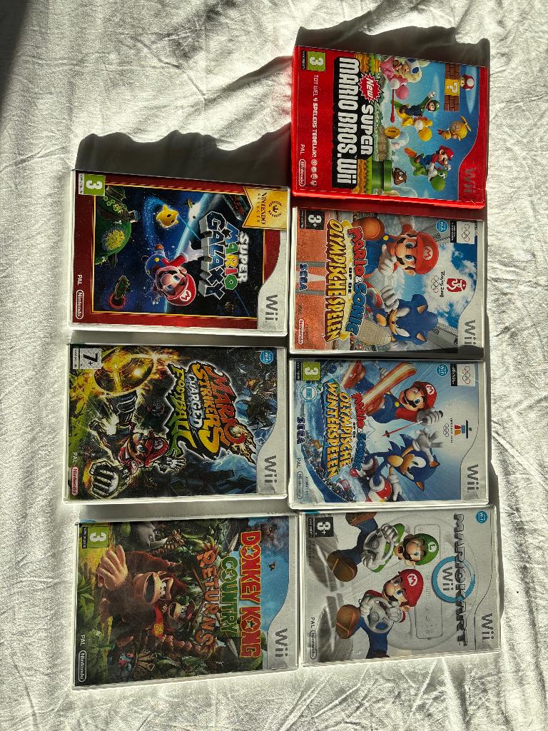 Nintendo Wii games Mario Kart, Mario Galaxy en meer, Ophalen, Gebruikt, Overige genres, Eén computer