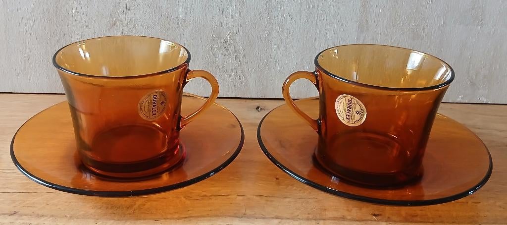 Duralex set van 2 grote kop en schotels, amberkleurig, Ophalen of Verzenden, Overige stijlen, Kop(pen) en/of Schotel(s), Glas
