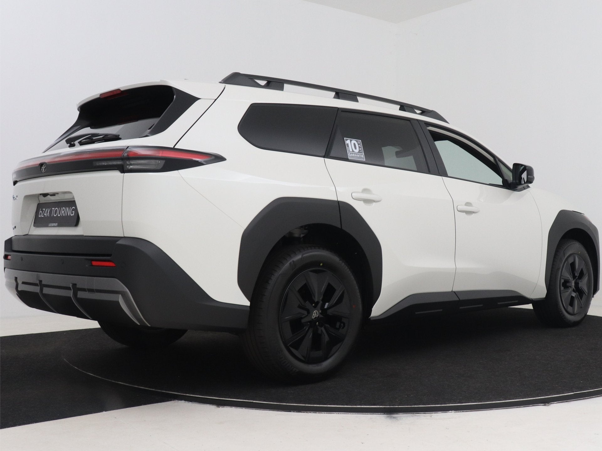 Toyota bZ4X Touring Dynamic 75 kWh (bj 2026, automaat), 12 maanden, Zwart, Leder en Stof, Wit