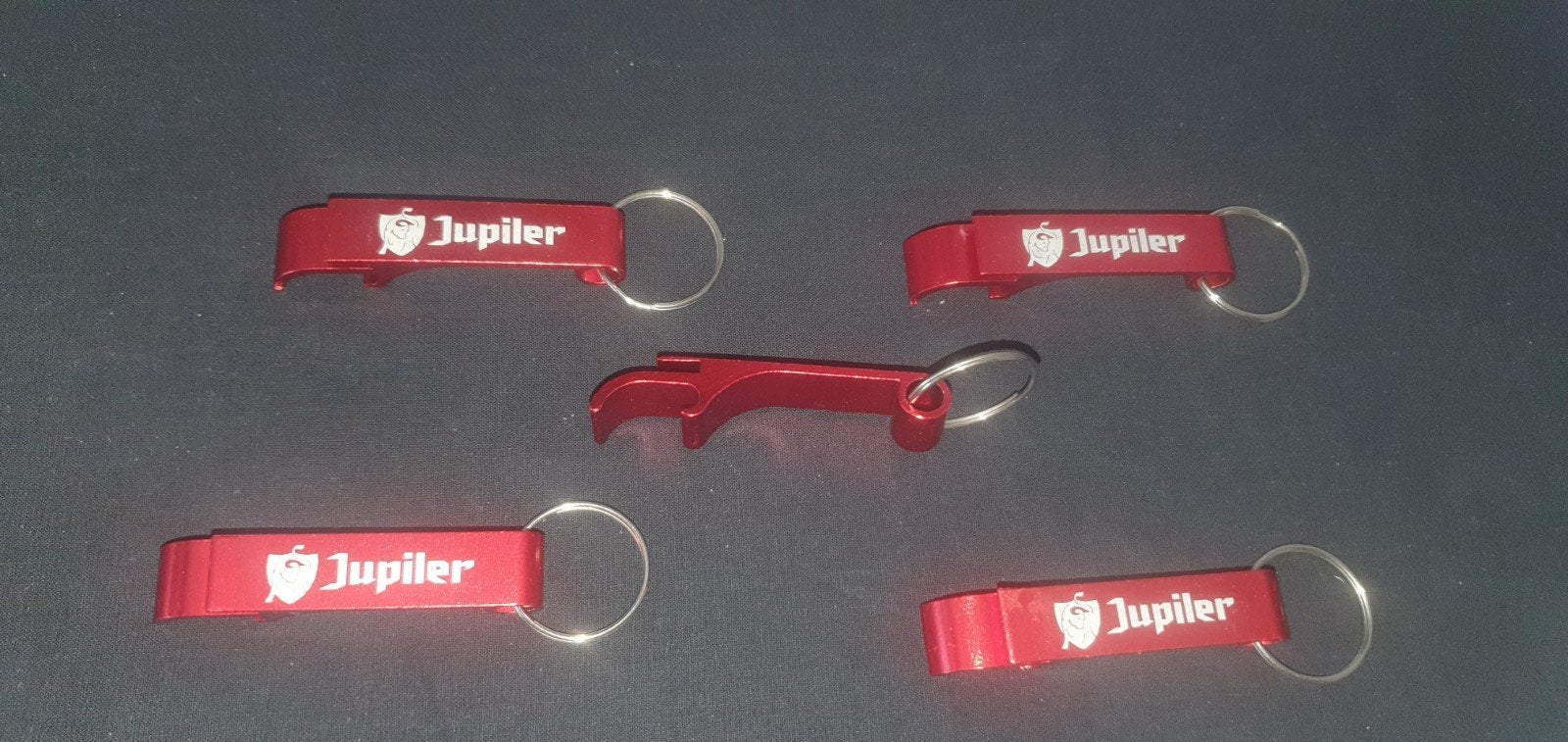 Set van 10 rode jupiler flesopeners met sleutelhanger., Ophalen of Verzenden, Overige typen